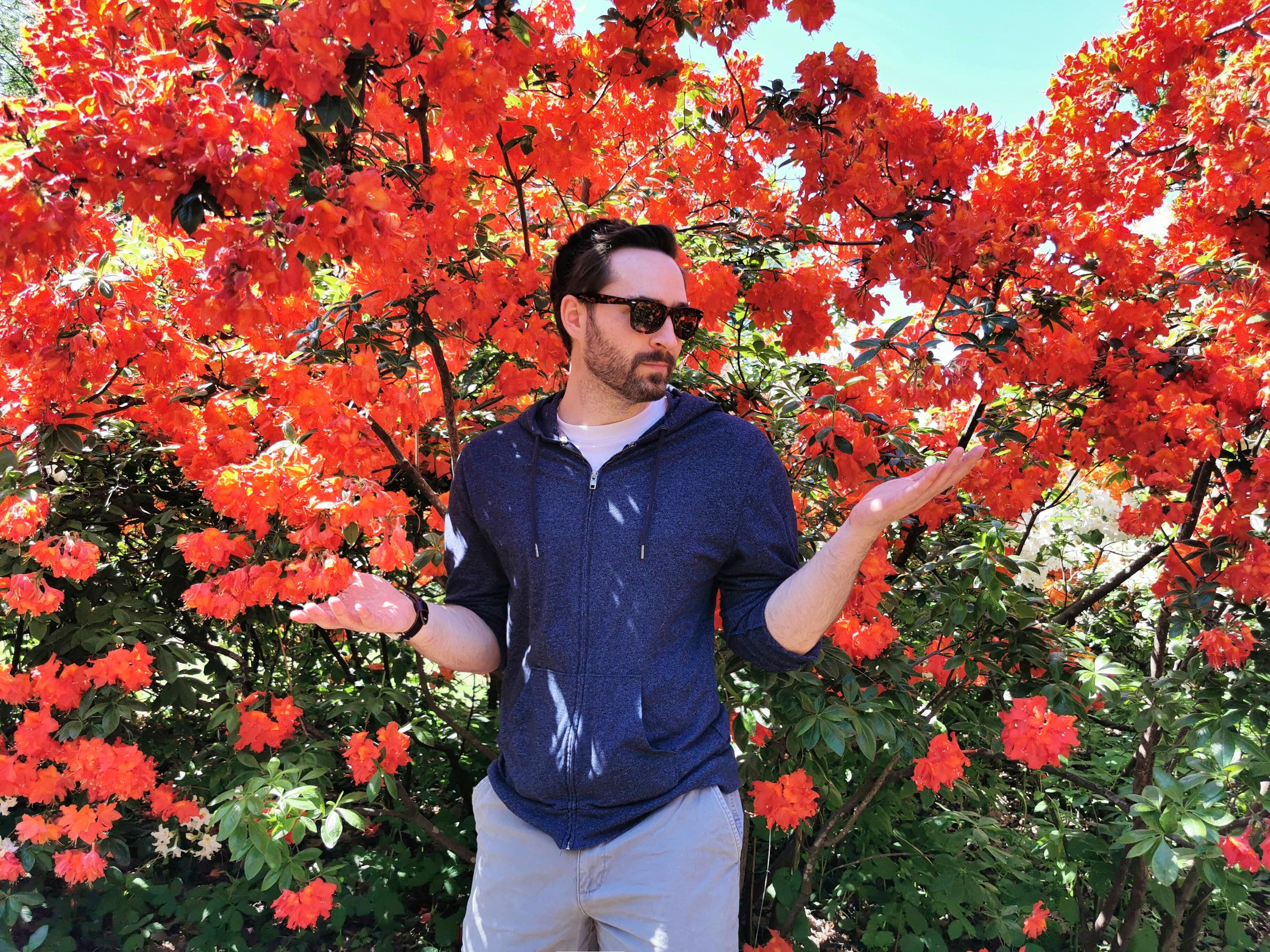 At UL Botanical Garden with red flowers. 